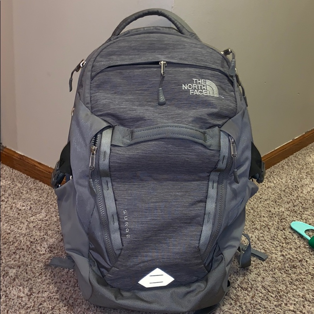 grey north face surge backpack